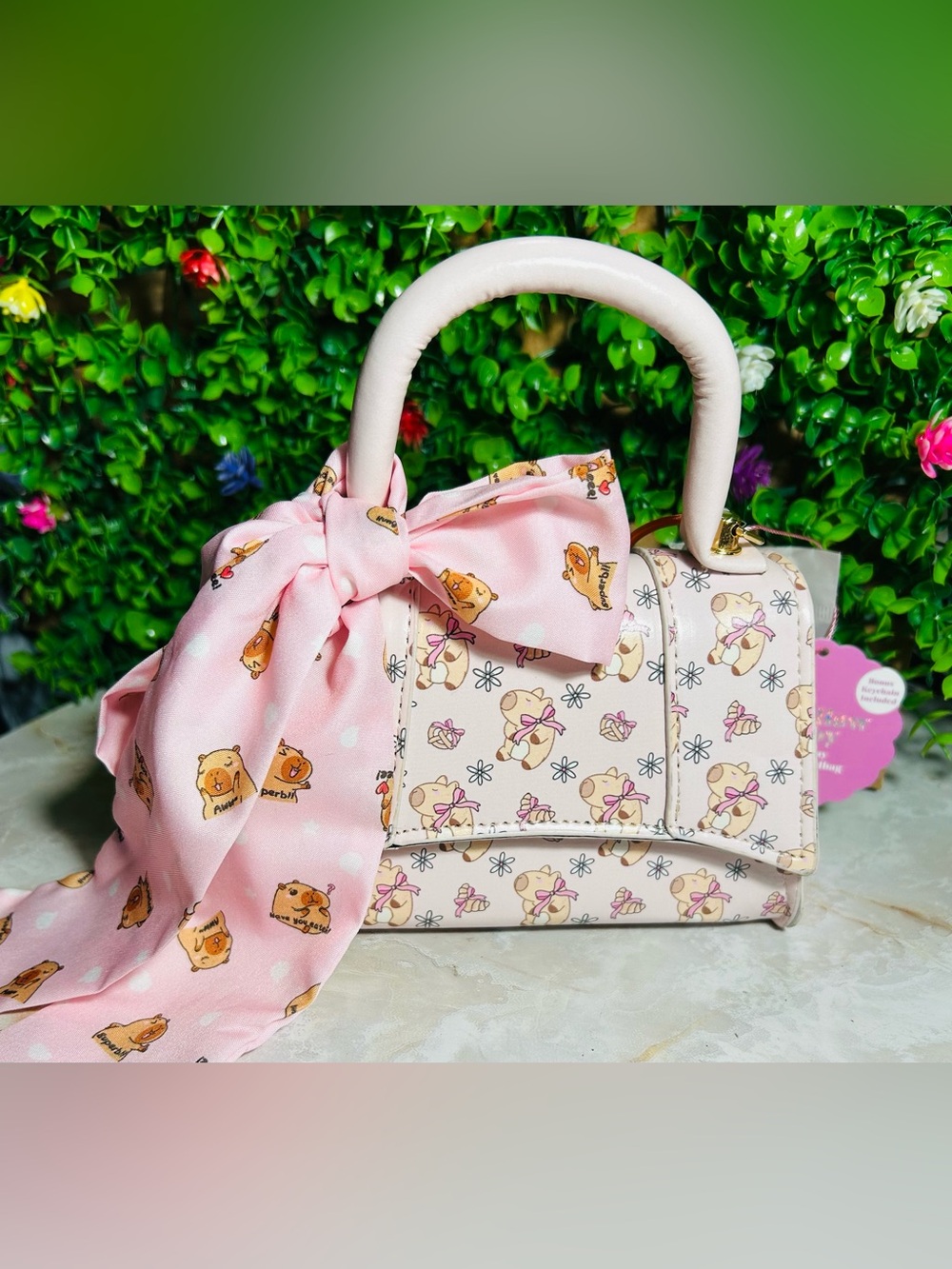 Mini hand bag with charm and pink scarf